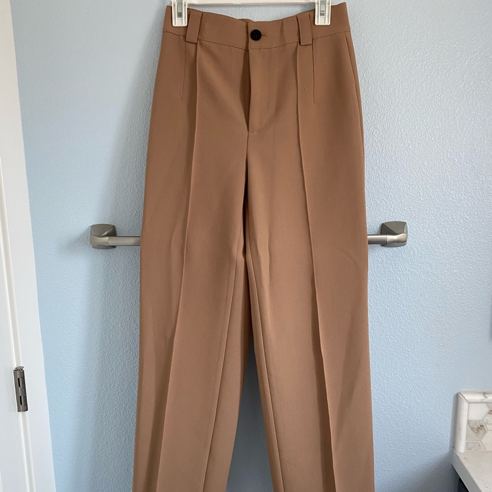 Full length tan trousers